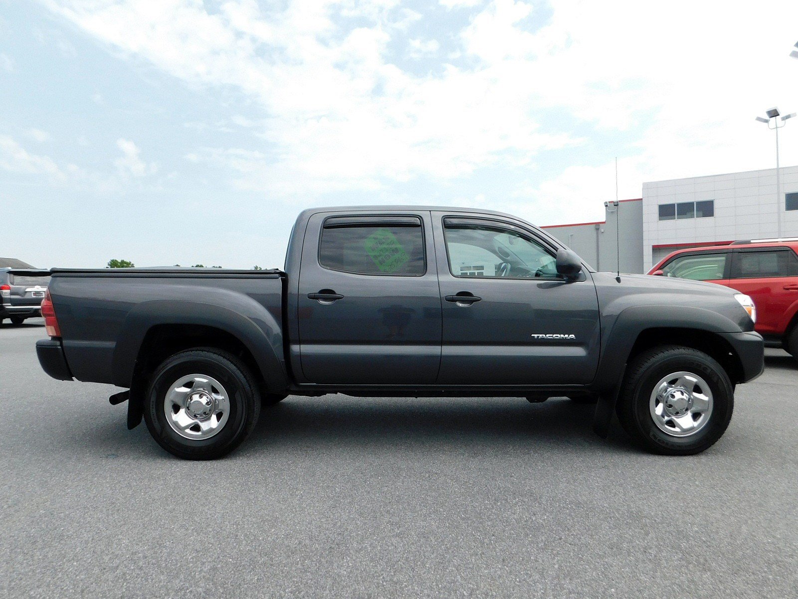 Pre-owned 2013 Toyota Tacoma Dbl Cab 4wd V6 At Crew Cab Pickup In East 